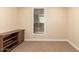 Neutral bedroom featuring a bright window and ample natural light at 2300 E Campbell Ave # 114, Phoenix, AZ 85016