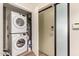 Modern laundry room features stacked washer and dryer at 2300 E Campbell Ave # 114, Phoenix, AZ 85016