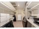 Walk-in closet with custom shelving and storage solutions, offering ample space at 2300 E Campbell Ave # 114, Phoenix, AZ 85016
