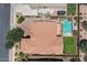 The home has a terracotta roof, swimming pool, outdoor spa, and manicured backyard at 23081 S 223Rd Way, Queen Creek, AZ 85142