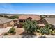Two-story home featuring a balcony, a three-car garage, and well-maintained landscaping at 23081 S 223Rd Way, Queen Creek, AZ 85142