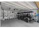 Spacious garage with ample storage and a golf cart, offering convenience and functionality at 23081 S 223Rd Way, Queen Creek, AZ 85142