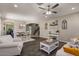 Bright living room with dark wood flooring, neutral paint and decor at 23081 S 223Rd Way, Queen Creek, AZ 85142