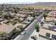 A vibrant aerial view of a neighborhood with well-maintained homes and streets, offering a sense of community at 23645 W Parkway Dr, Buckeye, AZ 85326
