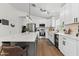 Stylish kitchen featuring white cabinets, stainless appliances, and a large center island at 23645 W Parkway Dr, Buckeye, AZ 85326