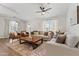 Comfortable living area with modern furnishings and plenty of natural light at 23645 W Parkway Dr, Buckeye, AZ 85326