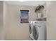 Convenient laundry room with modern washer and dryer, and natural light at 23733 S 209Th Pl, Queen Creek, AZ 85142