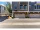 Two-car garage in a well-kept townhome complex with paved parking and mature landscaping at 2402 E 5Th St # 1411, Tempe, AZ 85288
