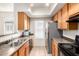 Functional kitchen with stainless appliances, and ample cabinet space for a practical and appealing cooking experience at 2402 E 5Th St # 1411, Tempe, AZ 85288