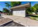 Community mailboxes located on a quiet street, with well-kept landscaping at 2402 E 5Th St # 1411, Tempe, AZ 85288