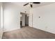 Comfortable main bedroom with soft carpet, a ceiling fan, ensuite access and ample space for relaxation and rest at 2402 E 5Th St # 1411, Tempe, AZ 85288