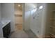 Bathroom with a single sink vanity and a walk-in shower at 24646 N Barley Rd, Florence, AZ 85132