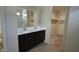 Bathroom featuring double vanity sinks and a walk-in shower at 24646 N Barley Rd, Florence, AZ 85132