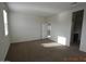 Bedroom featuring neutral paint, carpeted floors, and a view of an adjoining bathroom at 24646 N Barley Rd, Florence, AZ 85132