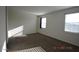 Bright bedroom with carpeted floors and lots of natural light at 24646 N Barley Rd, Florence, AZ 85132