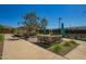 Outdoor community gathering area with seating, gazebo, landscaping, and tennis courts nearby at 24746 N 171St Ln, Surprise, AZ 85387