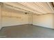 Spacious garage with epoxy floors and room for two cars at 24746 N 171St Ln, Surprise, AZ 85387