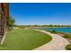 Walkway along the lake offers great views of the community and gathering spaces at 24746 N 171St Ln, Surprise, AZ 85387