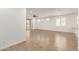 Expansive living area with tile flooring, large windows, and sliding glass doors to the patio at 24746 N 171St Ln, Surprise, AZ 85387