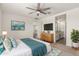 Relaxing main bedroom with ceiling fan, en-suite bathroom, and serene décor at 24746 N 171St Ln, Surprise, AZ 85387