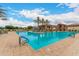 Spacious community pool with clear water, lounge areas, and resort-style amenities at 24746 N 171St Ln, Surprise, AZ 85387