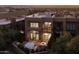 Aerial view of a luxury home with an outdoor patio and manicured landscaping at 25555 N Windy Walk Dr # 34, Scottsdale, AZ 85255