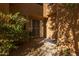 Inviting entryway featuring a decorative rug and desert landscaping at 25555 N Windy Walk Dr # 34, Scottsdale, AZ 85255