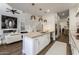 Bright kitchen island flows into the living room, creating a welcoming and spacious atmosphere at 25555 N Windy Walk Dr # 34, Scottsdale, AZ 85255