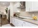 Modern kitchen featuring stainless steel appliances, light countertops, and stylish backsplash at 25555 N Windy Walk Dr # 34, Scottsdale, AZ 85255