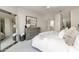 Relaxing bedroom with a large bed, soft carpet, and natural light, promoting a sense of comfort at 25555 N Windy Walk Dr # 34, Scottsdale, AZ 85255