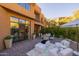 Charming patio with outdoor seating, lounge area, and access to interior through sliding doors at 25555 N Windy Walk Dr # 34, Scottsdale, AZ 85255