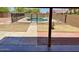 Private backyard featuring a fenced pool, patio area, and mature landscaping perfect for outdoor living at 2634 S 63Rd Dr, Phoenix, AZ 85043
