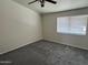 Simple bedroom with carpet and a window offering natural light at 2634 S 63Rd Dr, Phoenix, AZ 85043