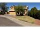 Attractive two-story home featuring a well-manicured lawn and a neutral-colored exterior at 2634 S 63Rd Dr, Phoenix, AZ 85043