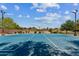 Well-maintained basketball court with ample lighting and lush landscaping, ideal for recreational activities at 277 E Kaibab Dr, Chandler, AZ 85249