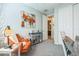 Cozy bedroom featuring a comfortable orange armchair and stylish decor accents at 277 E Kaibab Dr, Chandler, AZ 85249