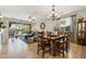 Open-concept dining area and living room feature ample light and backyard access at 277 E Kaibab Dr, Chandler, AZ 85249