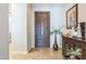 Elegant foyer with a stylish front door, tile flooring, and decorative accents, creating a welcoming entrance at 277 E Kaibab Dr, Chandler, AZ 85249