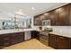 Modern kitchen with stainless steel appliances, granite countertops, and subway tile backsplash at 277 E Kaibab Dr, Chandler, AZ 85249