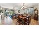 Open concept living and dining area with access to outdoor space at 277 E Kaibab Dr, Chandler, AZ 85249