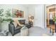 Bright living room with comfortable gray sofa and stylish decor accents at 277 E Kaibab Dr, Chandler, AZ 85249