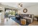 Comfortable living area featuring sliding glass doors to the backyard and a large sectional sofa at 277 E Kaibab Dr, Chandler, AZ 85249