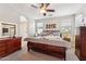 Comfortable main bedroom featuring a ceiling fan and ensuite bath at 277 E Kaibab Dr, Chandler, AZ 85249