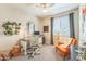 Cozy home office with a stylish desk, chair, and ample natural light, ideal for remote work at 277 E Kaibab Dr, Chandler, AZ 85249