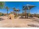 Fun playground featuring play structures, canopies, and a sand pit, offering a safe and engaging play area at 277 E Kaibab Dr, Chandler, AZ 85249