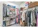 Walk-in closet with ample storage space, shelving, and hanging rods for organized clothing and accessories at 277 E Kaibab Dr, Chandler, AZ 85249