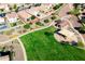 Aerial view of the home featuring green spaces, walking trails, and a nearby park at 37252 N Big Bend Rd, San Tan Valley, AZ 85140