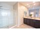 Bathroom with tile flooring, dual vanity, and glass enclosed shower at 37252 N Big Bend Rd, San Tan Valley, AZ 85140