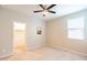Bright bedroom features neutral paint, plush carpet, and a walk-in closet at 37252 N Big Bend Rd, San Tan Valley, AZ 85140