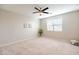 Bright bedroom with neutral walls, carpet, and a ceiling fan for added comfort at 37252 N Big Bend Rd, San Tan Valley, AZ 85140